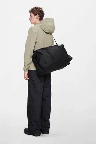 Rains Borsa da viaggio unisex Hilo Weekend nera